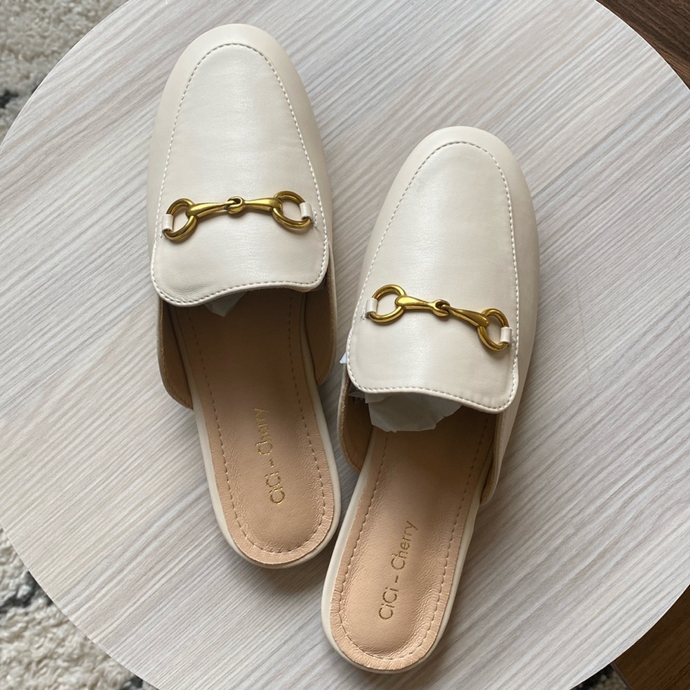 Designer inspired Horsebit backless loafer soft faux leather. Size 7. Brand new.
